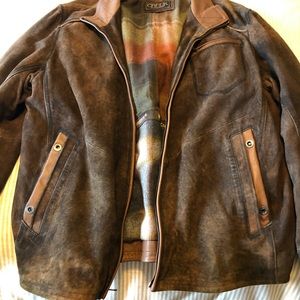 From Kent & Outfitters, this Madison Creek suede jacket- brand new condition